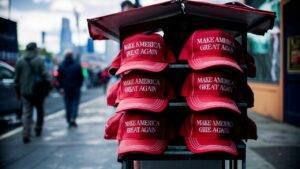 A stall with MAGA merch on a street